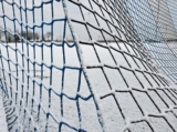 Sneeuwlaag bedekt sportpark 'Het Springer' (19/37)